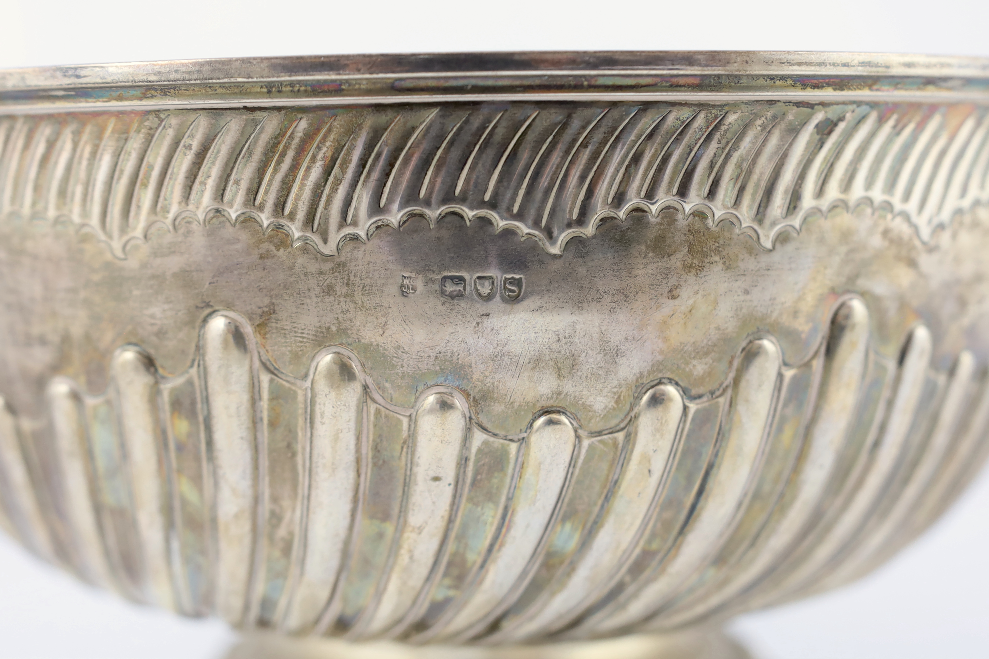 A late Victorian demi fluted silver circular punch bowl, by Goldsmiths & Silversmiths Co. Ltd., diameter 32cm, 42.6oz.